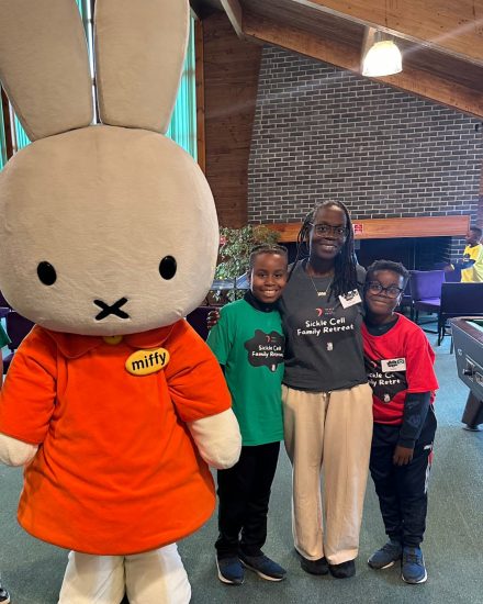 Full size Miffy character poses with a family at the sickle cell family retreat